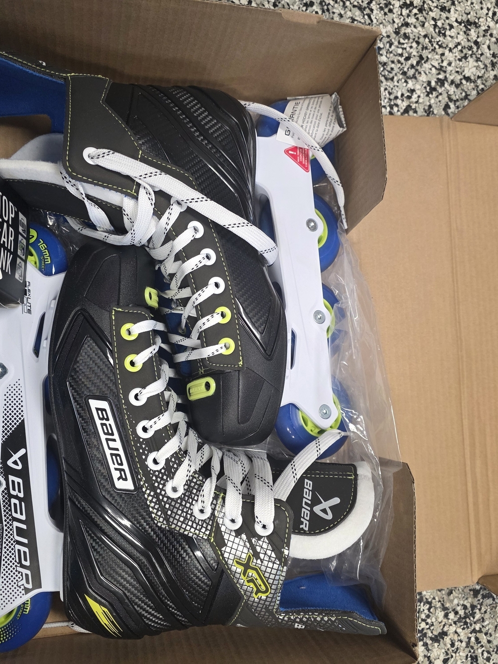 Bauer Black Inline Hockey Skates with Lime and Blue Accents